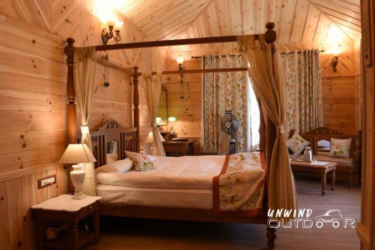 All places worth getting to take time. Getting to Manali is a long journey only made better by the stunning vistas. But getting to Manali is definitely worth it. Nestled deep in the Bipasha Valley, there is a stunningly luxurious property that is committed to providing the best possible experience for its guests. Urvashi’s Retreat is a property spread over a wide area of rolling greens. Classified by ITC WelcomHeritage group as one of their Nature Resorts, it is an enterprise personally-run by Urvashi and her team. The idea of Urvashi’s Retreat was envisioned by Urvashi’s family in 2014. Being frequent visitors to the Himalayas, they wanted to give back to the Devbhoomi but as hosts this time. Thus, Urvashi’s Retreat was born. When a project is born out of passion, it shows. Despite the luxurious ambience of the retreat, there is a sense of home that pervades throughout. The property boasts of a spectacular setting, set amidst slopes of coniferous trees and icy blue mountains in the background. Cottages dot the landscape like mushrooms sprouting out from the earth and make for the most idyllic picture. A 23-room property, the retreat offers a host of accommodations — standard rooms, deluxe rooms, superior rooms, premium rooms (duplexes), a suite, and an exclusive villa. The rooms are segregated based on varying levels of privacy and space. Every room comes with a balcony overlooking the gorgeous mountains,and are fashioned masterfully using wood. The interiors are done up so tastefully that they look like pictures from fairytales. Each room is equipped with WiFi, heating, a safe, a mini-fridge, a tea station, a satellite-linked television, and a DVD player. The same grandeur extends to the bathroom - a heavenly luxury in the mountains.